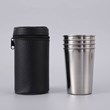 Set of 4 steel mugs with leather covers